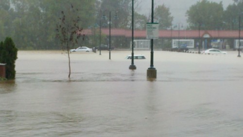 Cars under water at train station