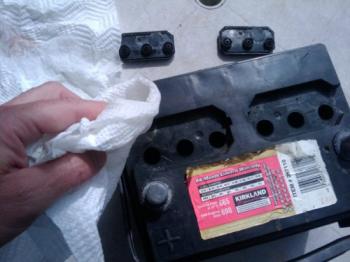 Clean around the cell holes with a damp towel Clean around the cell holes with a damp towel