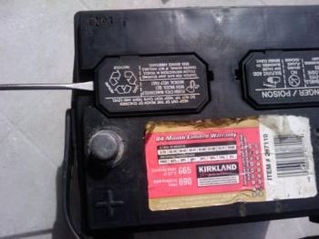 Carefully pry off the battery cell covers Carefully pry off the battery cell covers