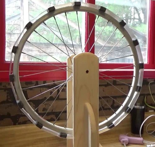 Bedini SSG bicycle wheel with magnets secured in place