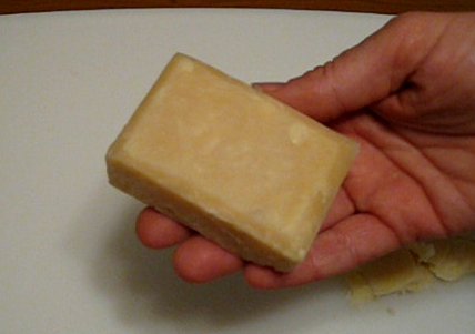 A finished and trimmed bar of homemade soap