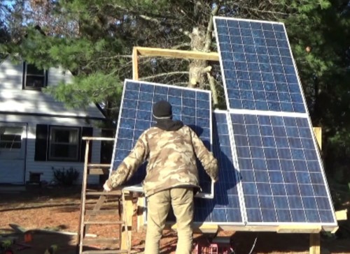Mounting the solar panels on their adjustable rack Mounting the solar panels on their adjustable rack