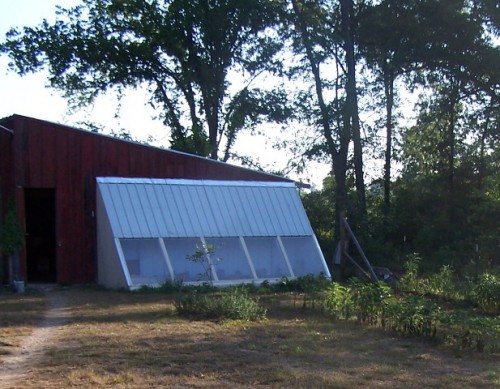 A lean-to greenhouse requires less building materials and retains more heat