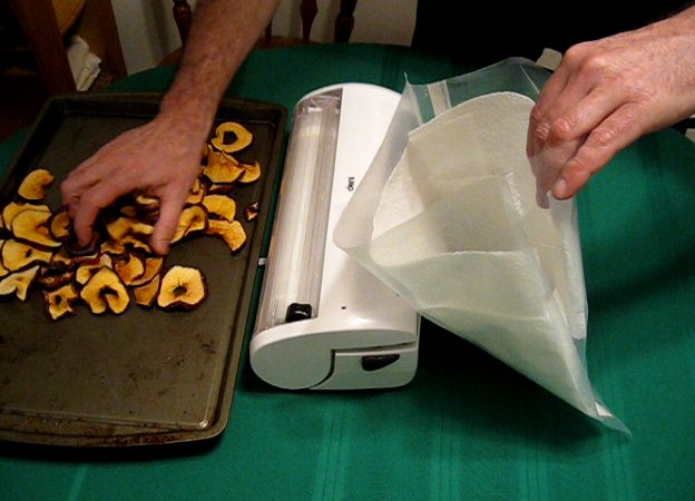 Line the vacuum sealer bag with paper towels Line the vacuum sealer bag with paper towels